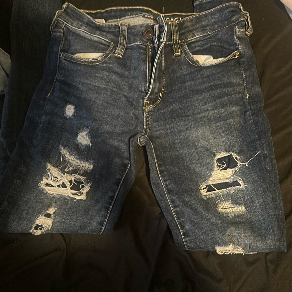 they have fabric behind the rips so no skin shown